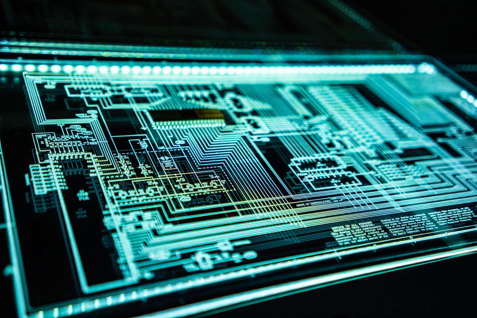 A close up of a computer screen with a circuit board on it.