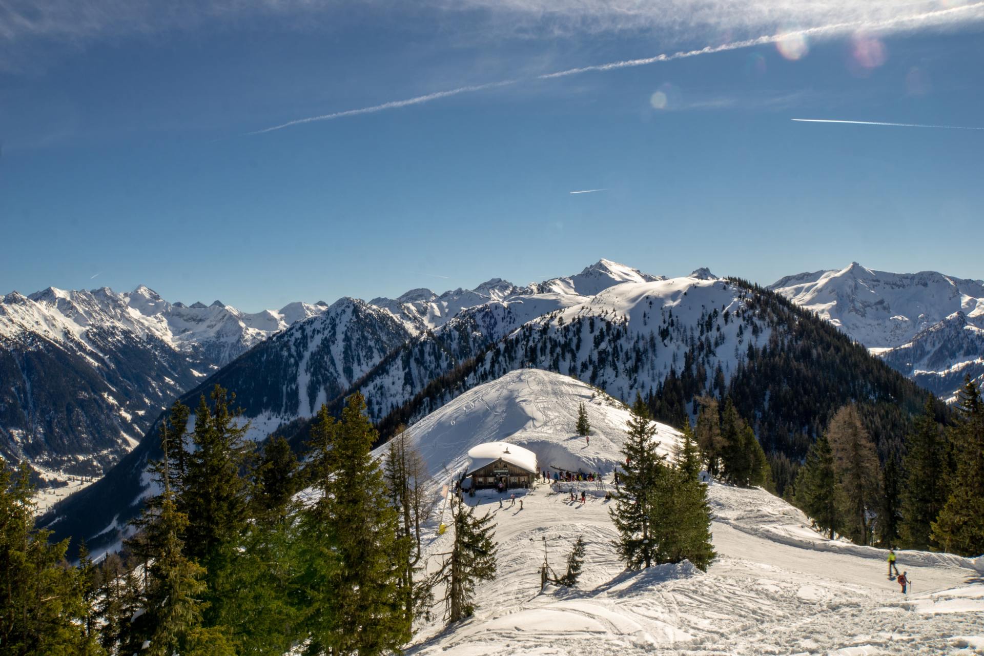 Cabin Set Atop Snowy Mountains
