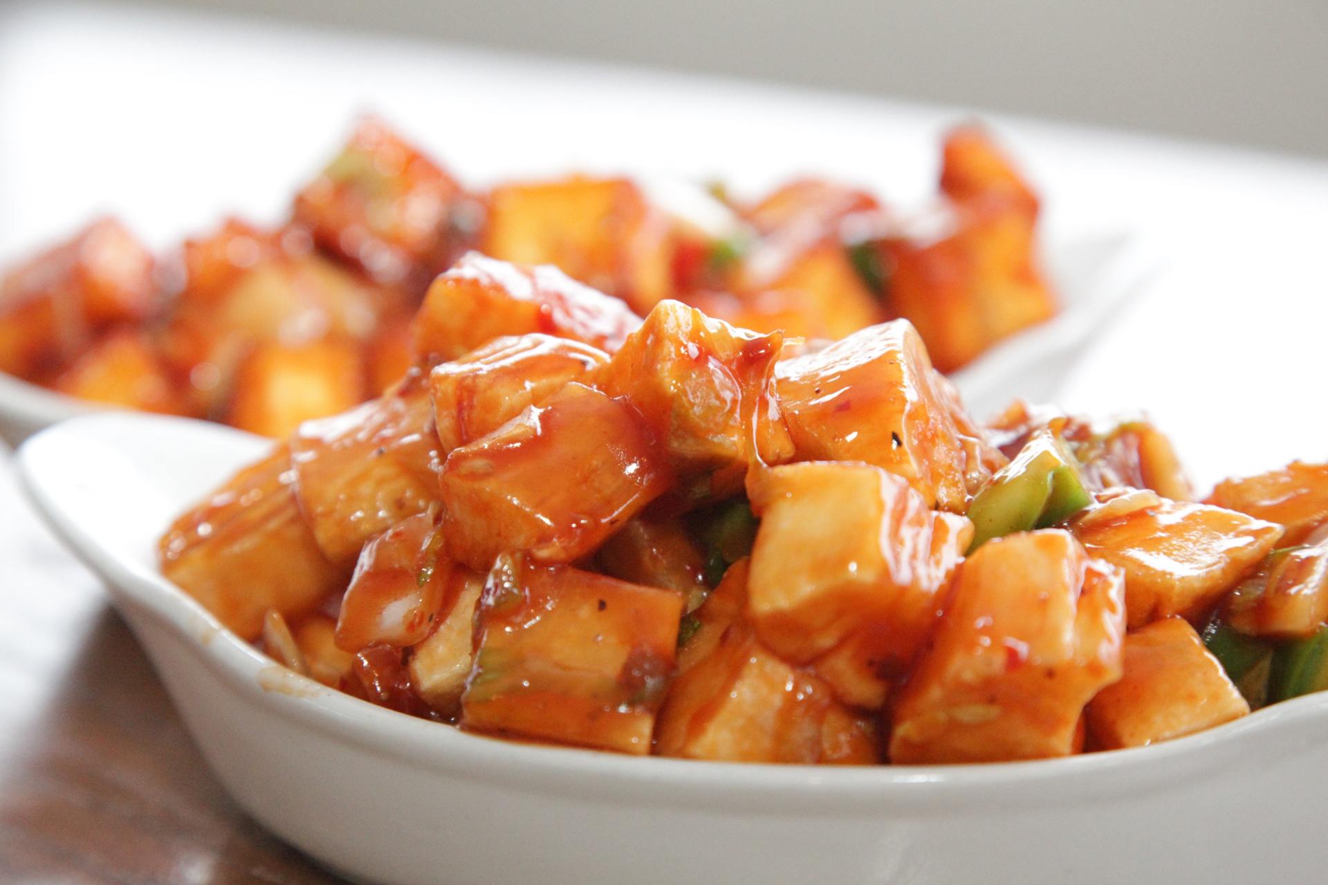 A close up of a bowl of food on a table