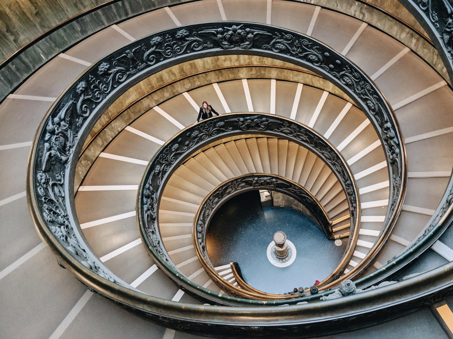 An aerial view of a spiral staircase in a building.