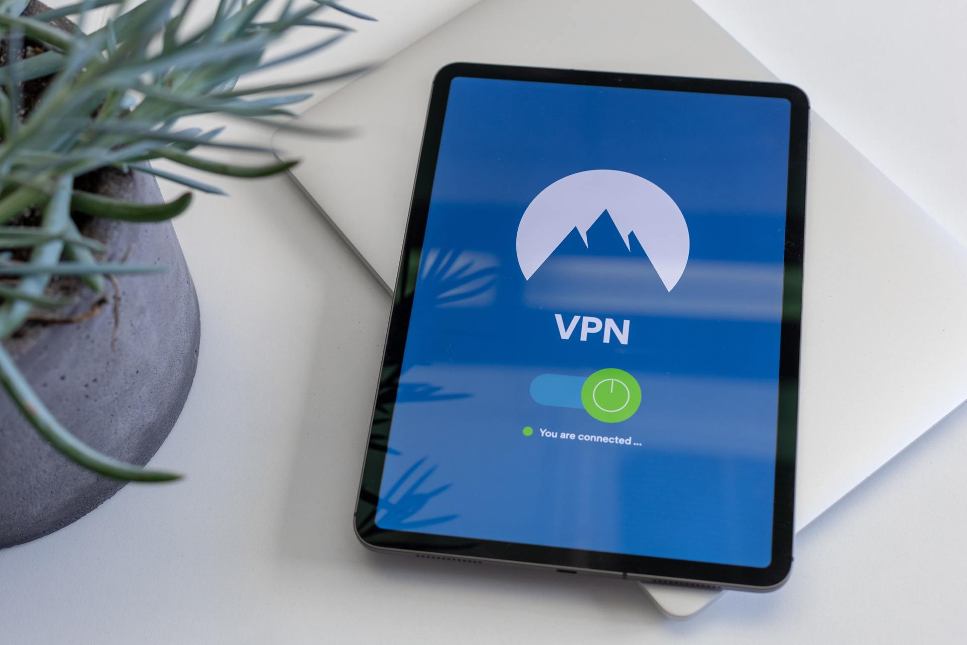 A tablet with a screen that says vpn on it