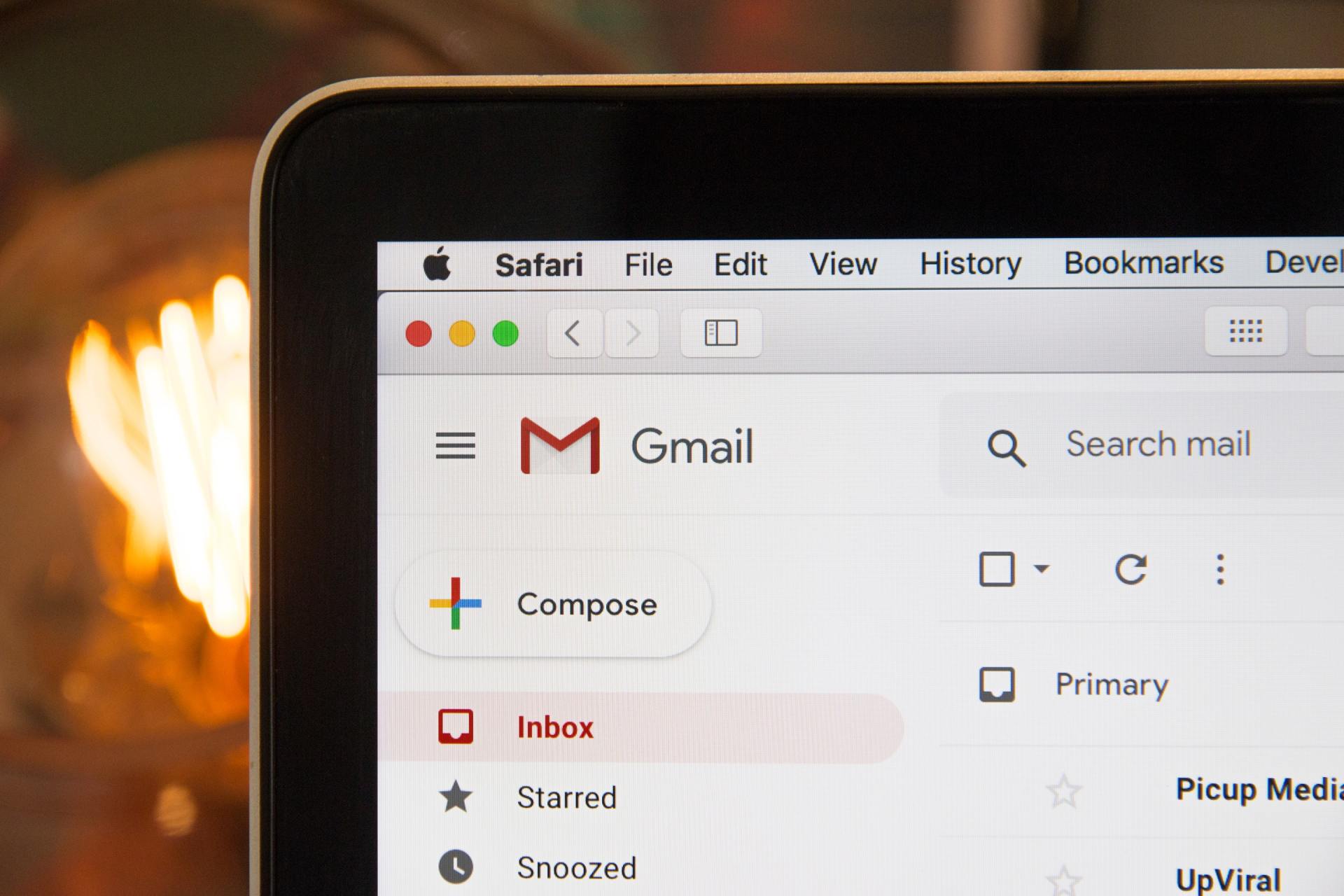A close up of a laptop screen showing a gmail page