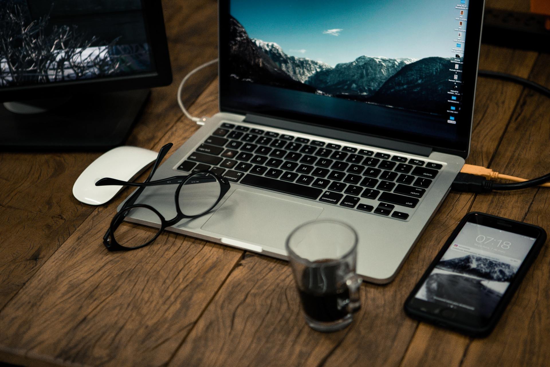 Computer on Wooden Table