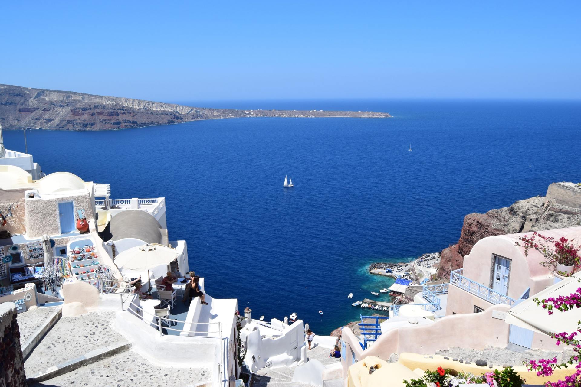 A view of the ocean from the top of a hill