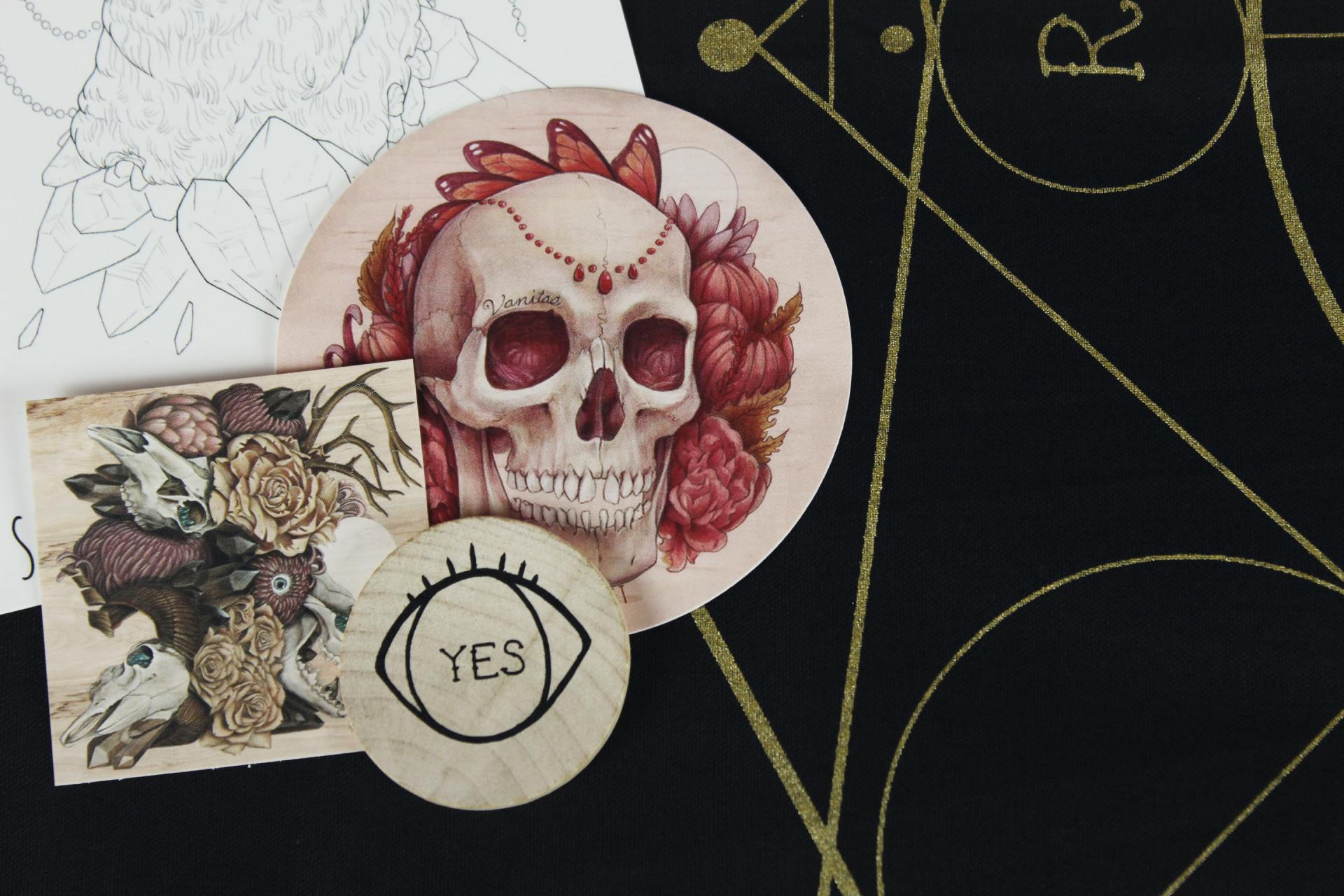 A skull with roses on it is on a plate next to a yes sign