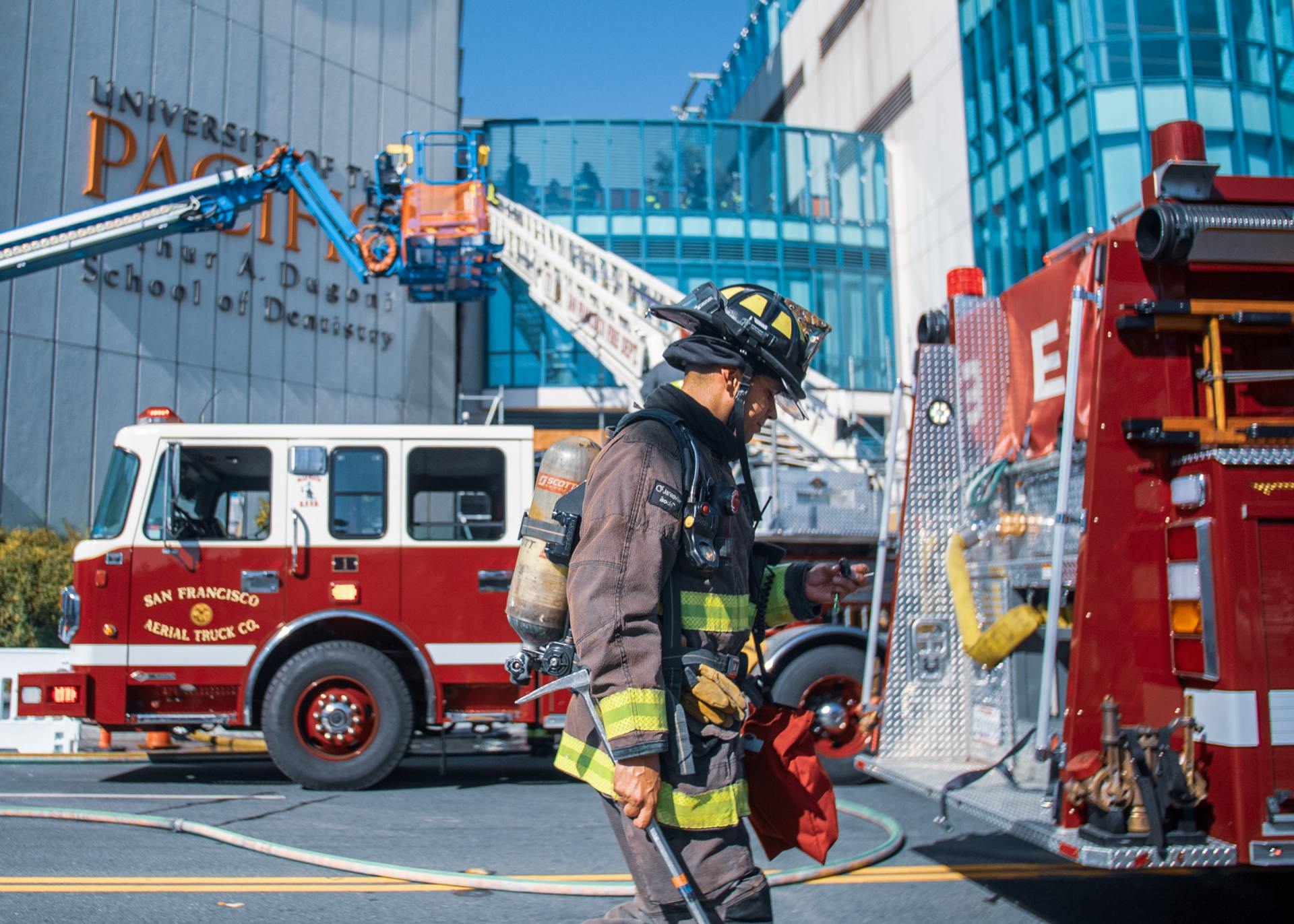 Firefighters at their engine