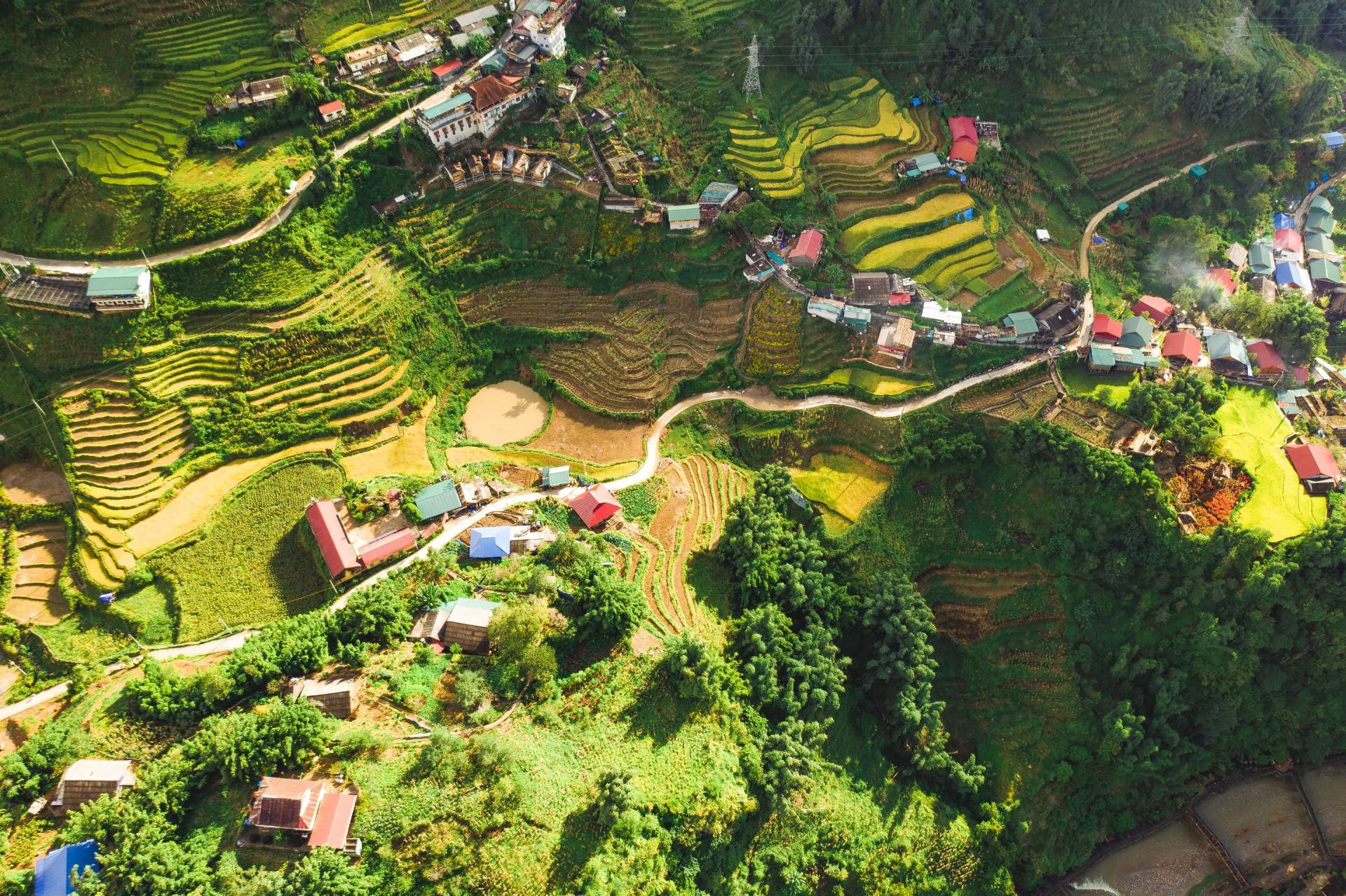 An aerial view of a small village on a hillside