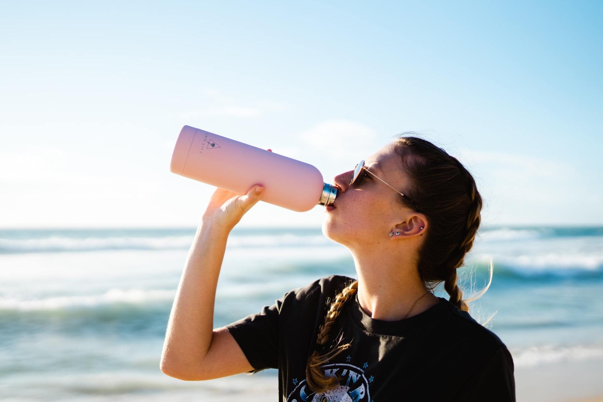 image of young woman drinking water