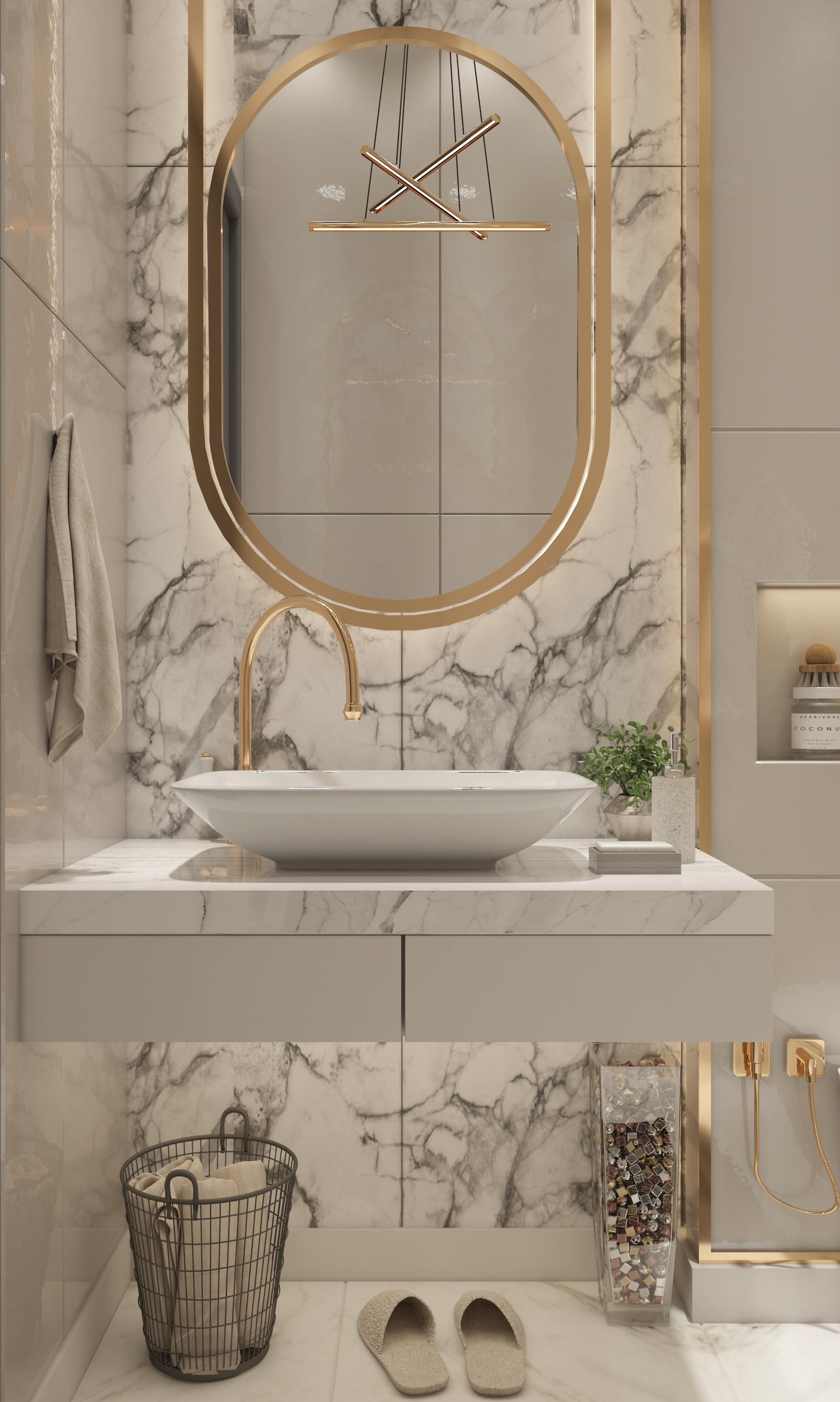 A bathroom with a sink , mirror and marble wall.
