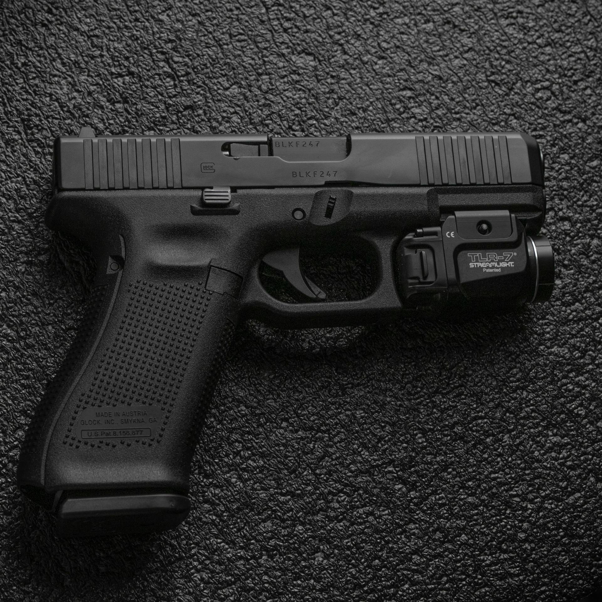 pistol laying on ground