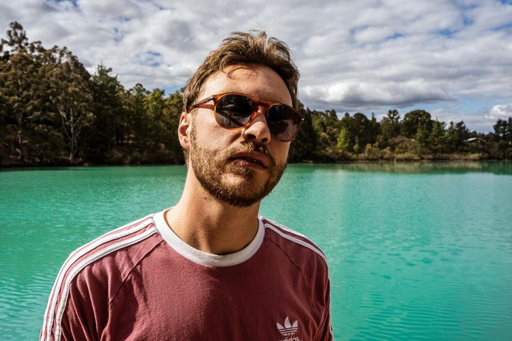 man showcasing Persol Sunglasses