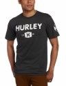 Man wearing a black Hurley T-shirt with a white logo on the chest