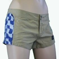 Short khaki shorts with blue patterned side panels on a mannequin torso