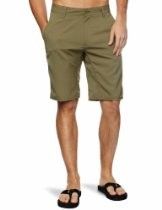 Model wearing olive shorts and black sandals, standing against a white background.