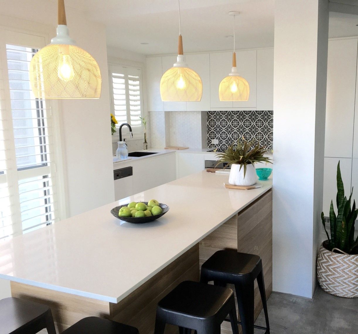 A Kitchen With White Cabinets and Granite Counter Tops — High Kraft Kitchens and Joinery in Berkeley, NSW