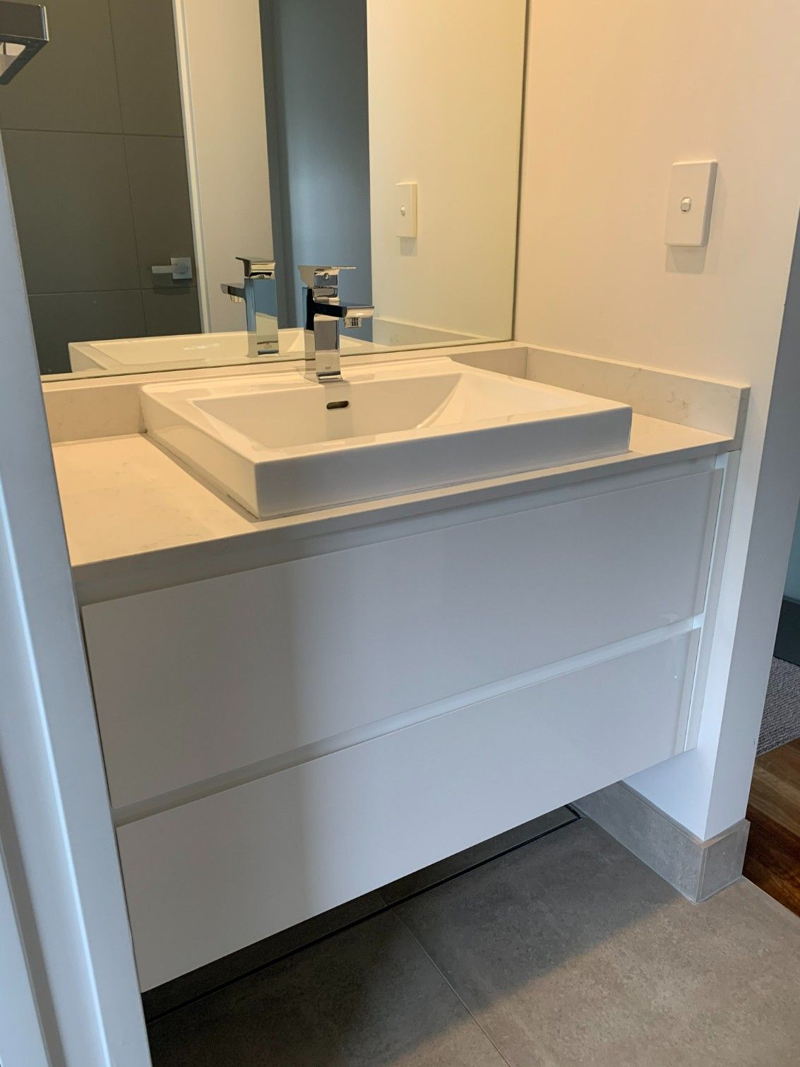 A Bathroom With a Sink, Mirror and Drawers — High Kraft Kitchens and Joinery in Berkeley, NSW