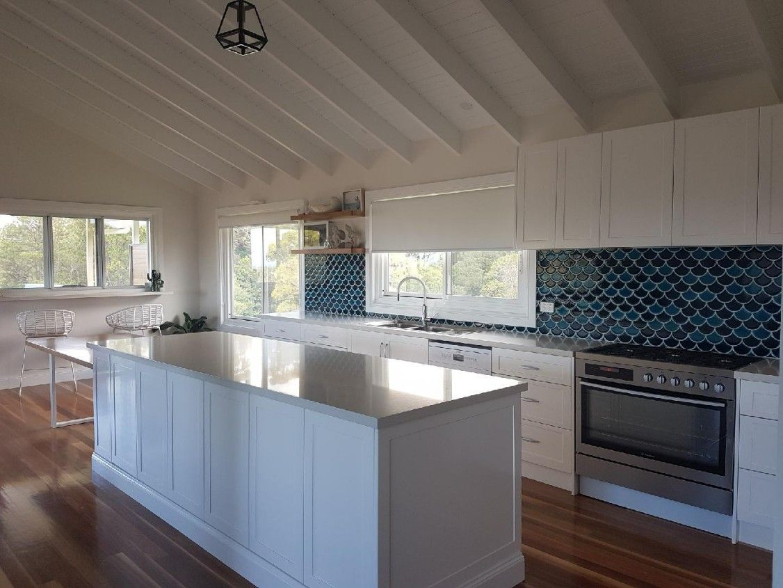 There is a Large Island in the Middle of the Kitchen — High Kraft Kitchens and Joinery in Berkeley, NSW