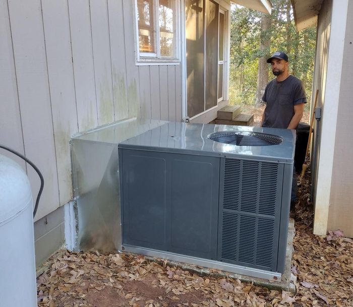 Man Standing Near HVAC Unit — Townville, SC — Andy’s HVAC Service LLC