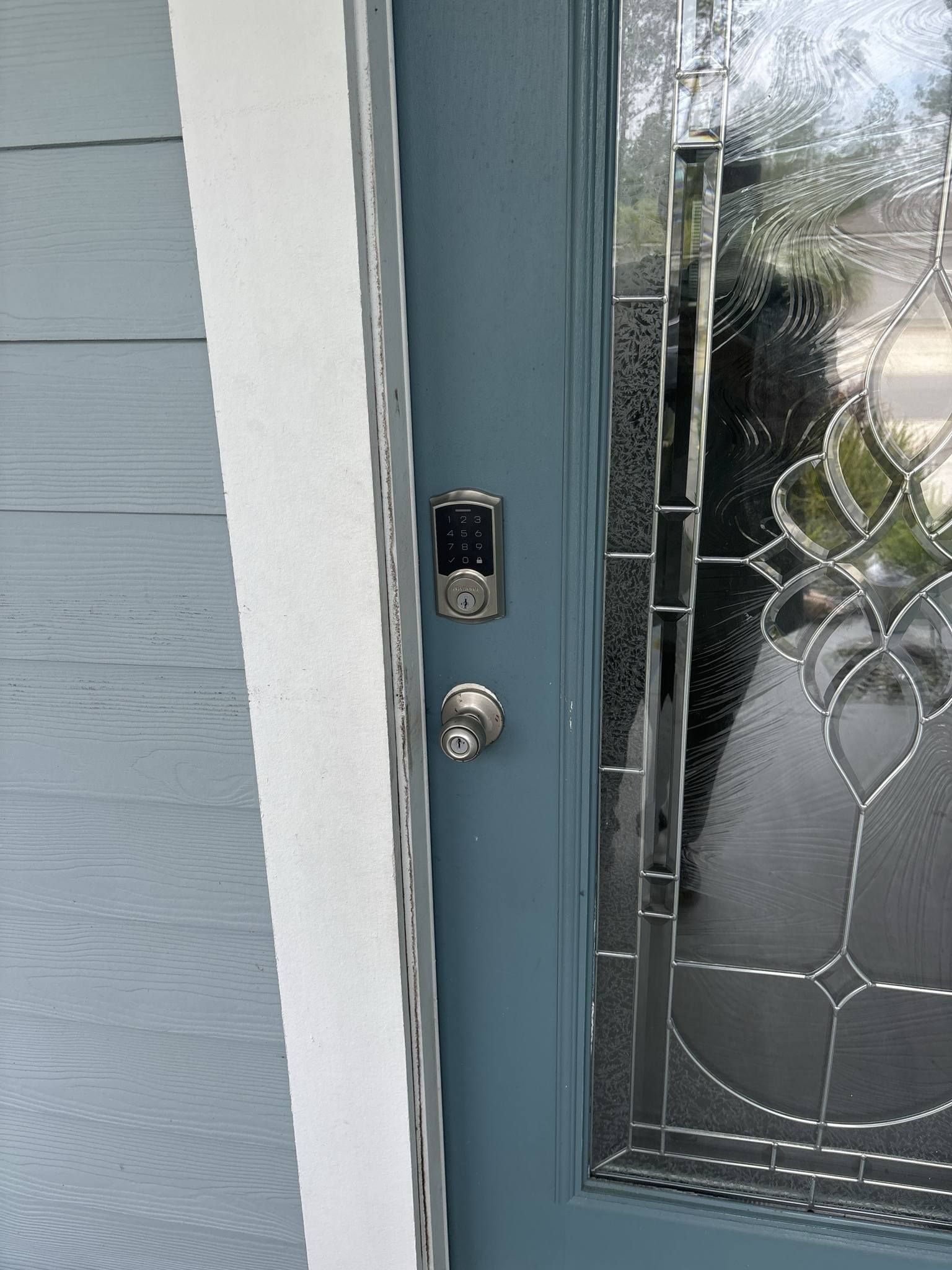 A close up of a door with a lock on it.