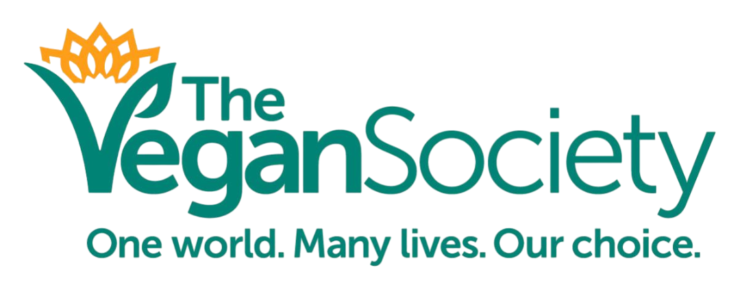 Logo of The Vegan Society. Green text with a leaf design and an orange floral element. 