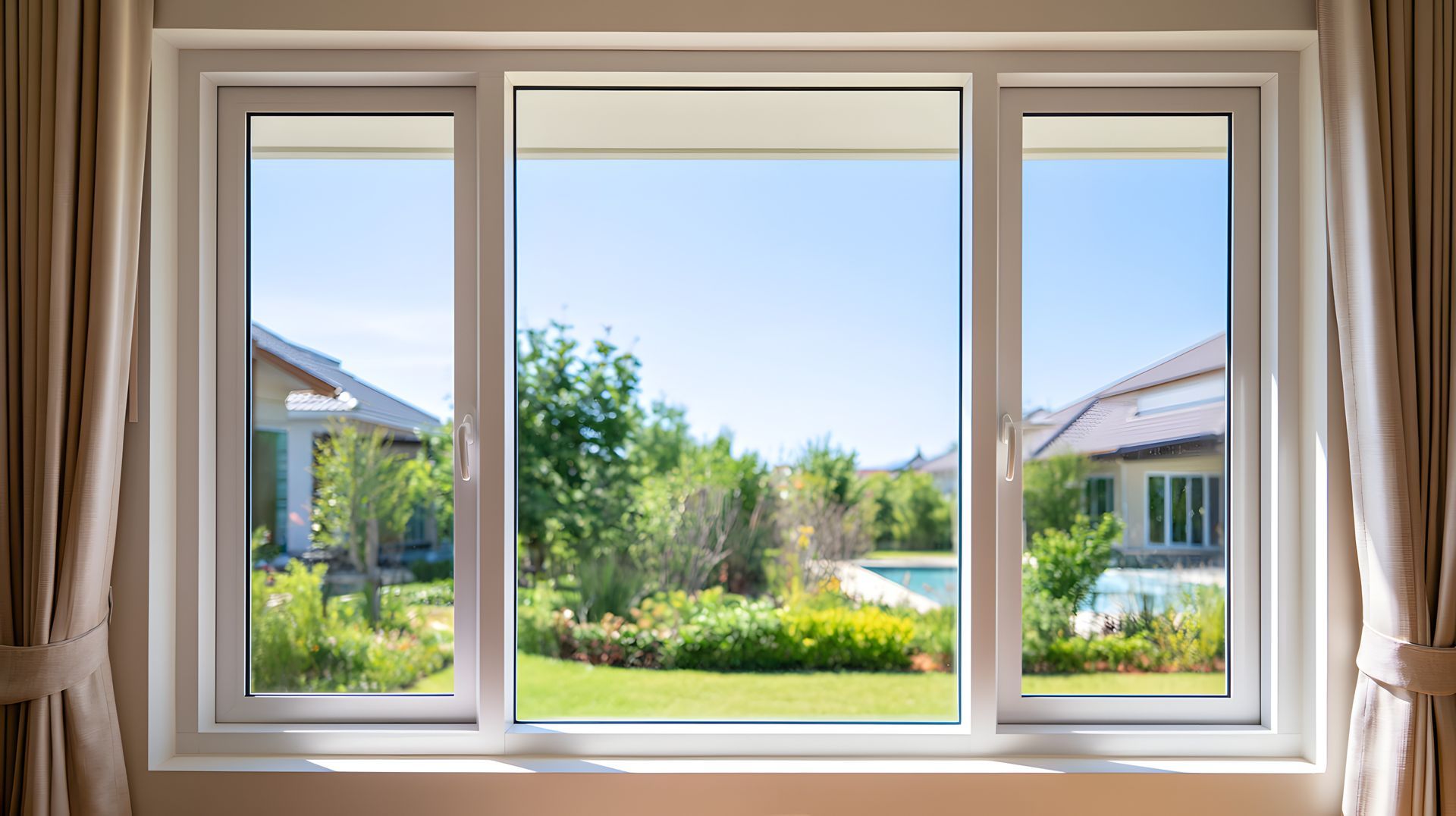 Newly installed energy-efficient vinyl windows in a residential home with a clear outdoor view