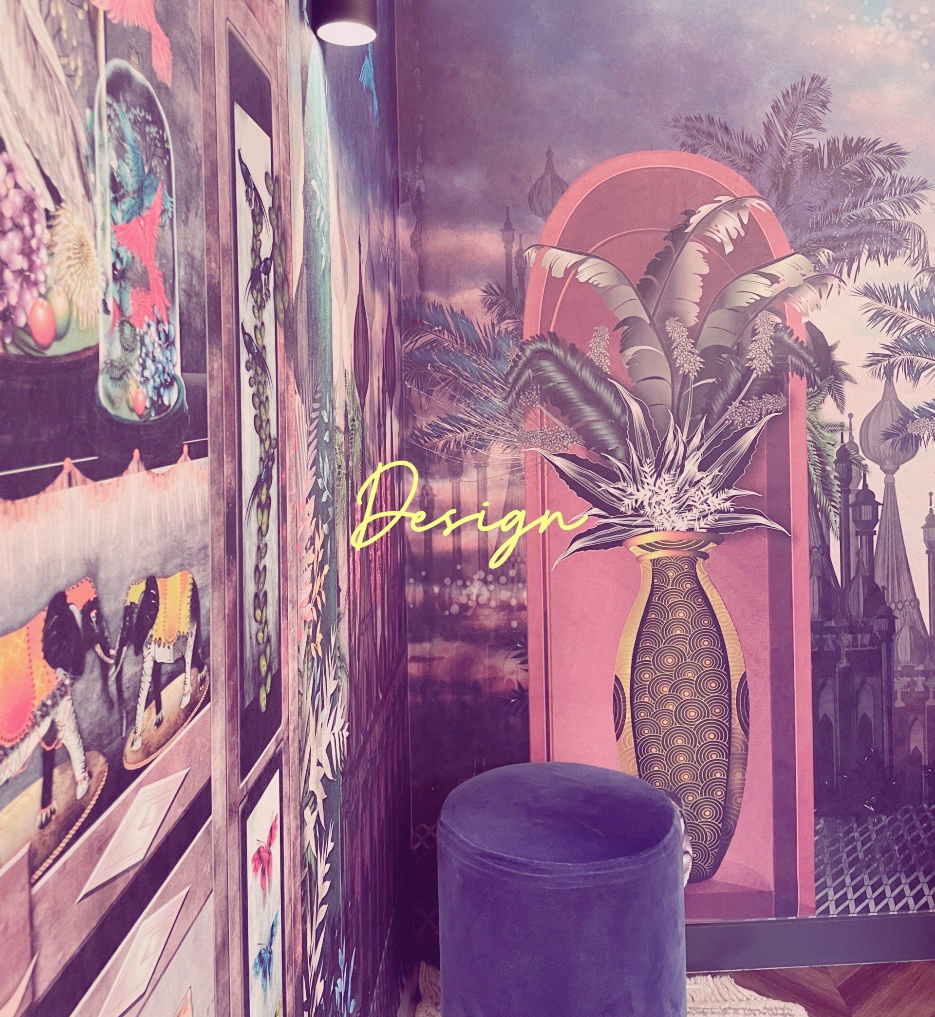 Mural wall with tropical plants, abstract art, neon “Dream” sign, and a purple velvet stool