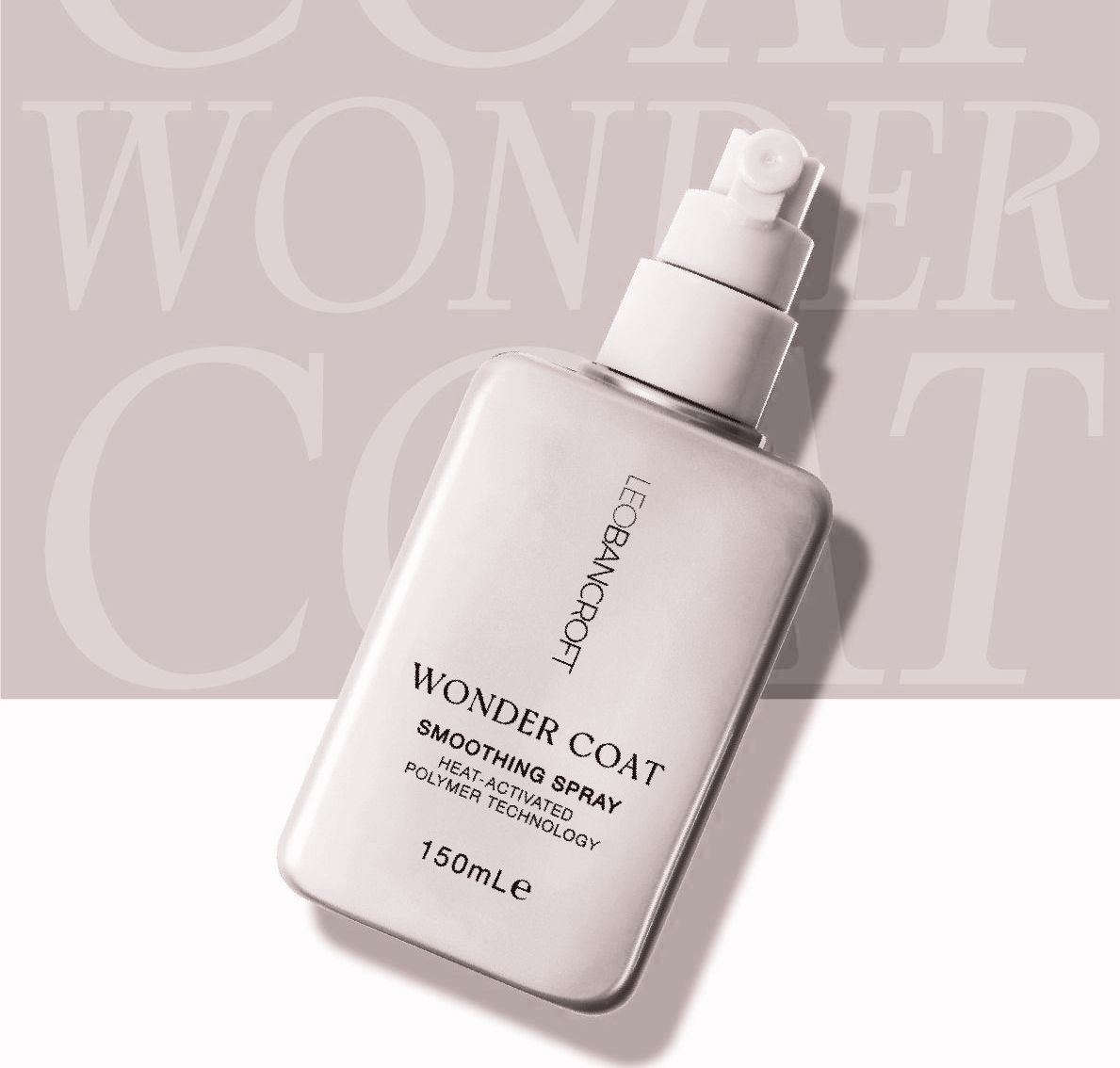 Leo Bancroft “Wonder Coat” conditioning milk bottle with pump on a pale pink background