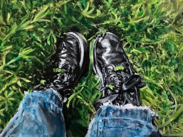 A painting of a person 's feet laying in the grass.