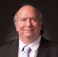 A man in a suit.