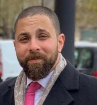 Professional headshot of Musab Gunes, Esq., Privacy Counsel specializing in Immigration Law, Data Privacy Law and Compliance Audits