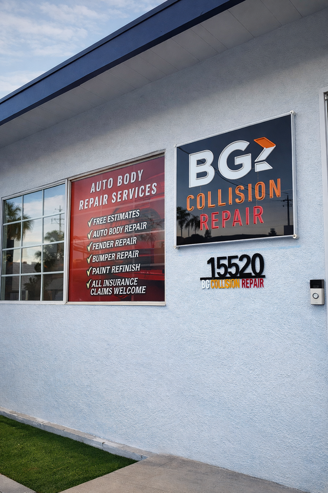 Exterior view of BGZ Collision Repair shop with signage listing services and the address 15520.