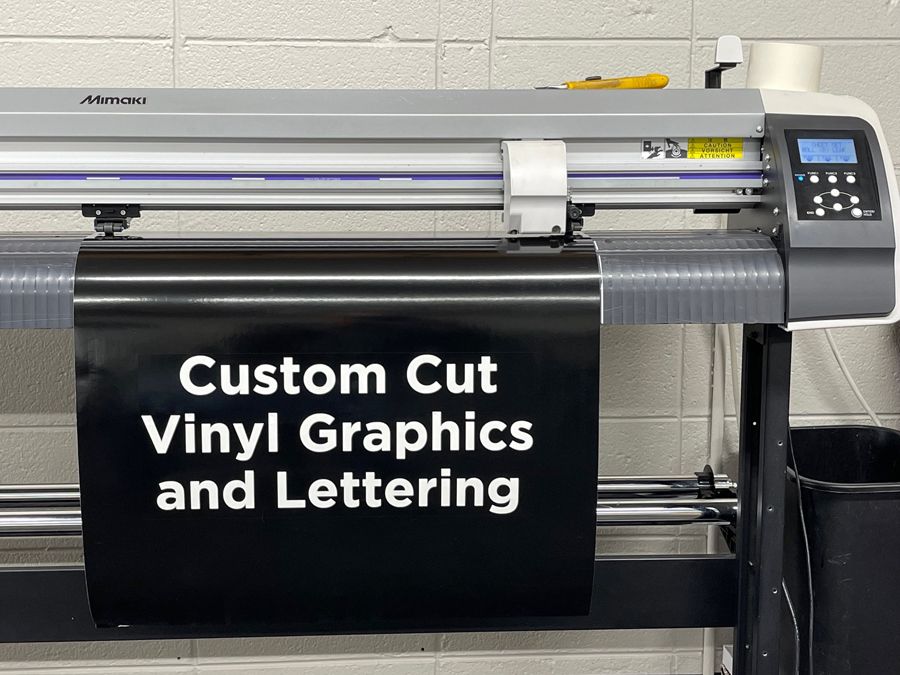 Woman Working At Digital Printing Company — Springfield, MO — Quality Trim & Sign Woman Working At Digital Printing Company — Springfield, MO — Quality Trim & Sign