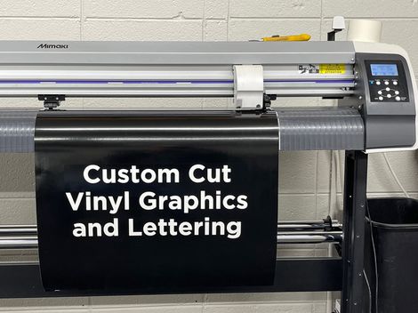 Woman Working At Digital Printing Company — Springfield, MO — Quality Trim & Sign Woman Working At Digital Printing Company — Springfield, MO — Quality Trim & Sign