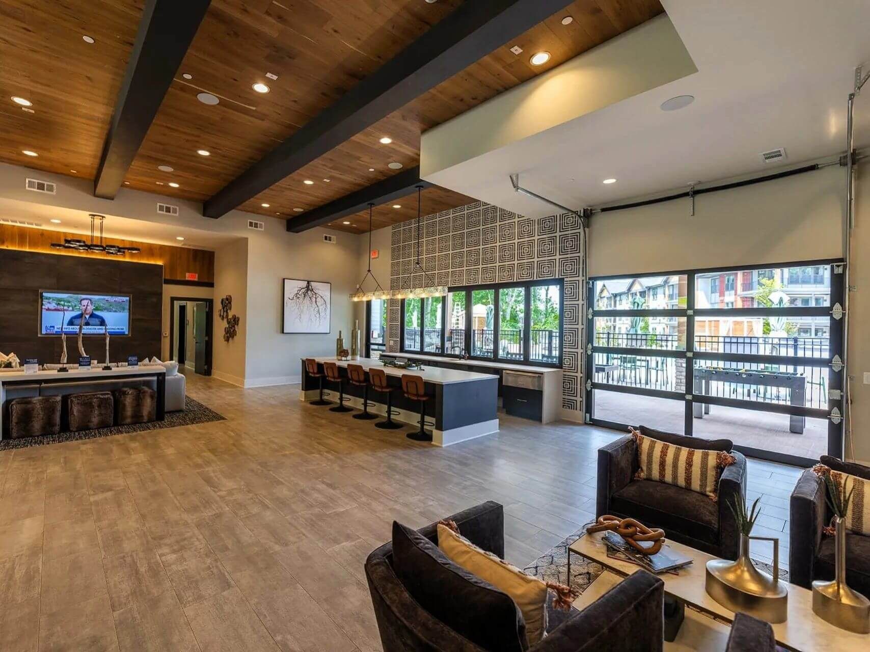 A living room with a lot of furniture and a television
