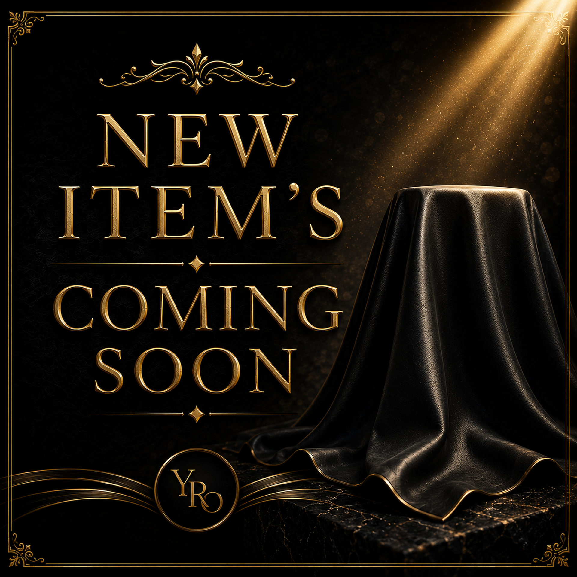 Gold “New Item’s Coming Soon” text on a black background with a draped, covered object under spotlight.