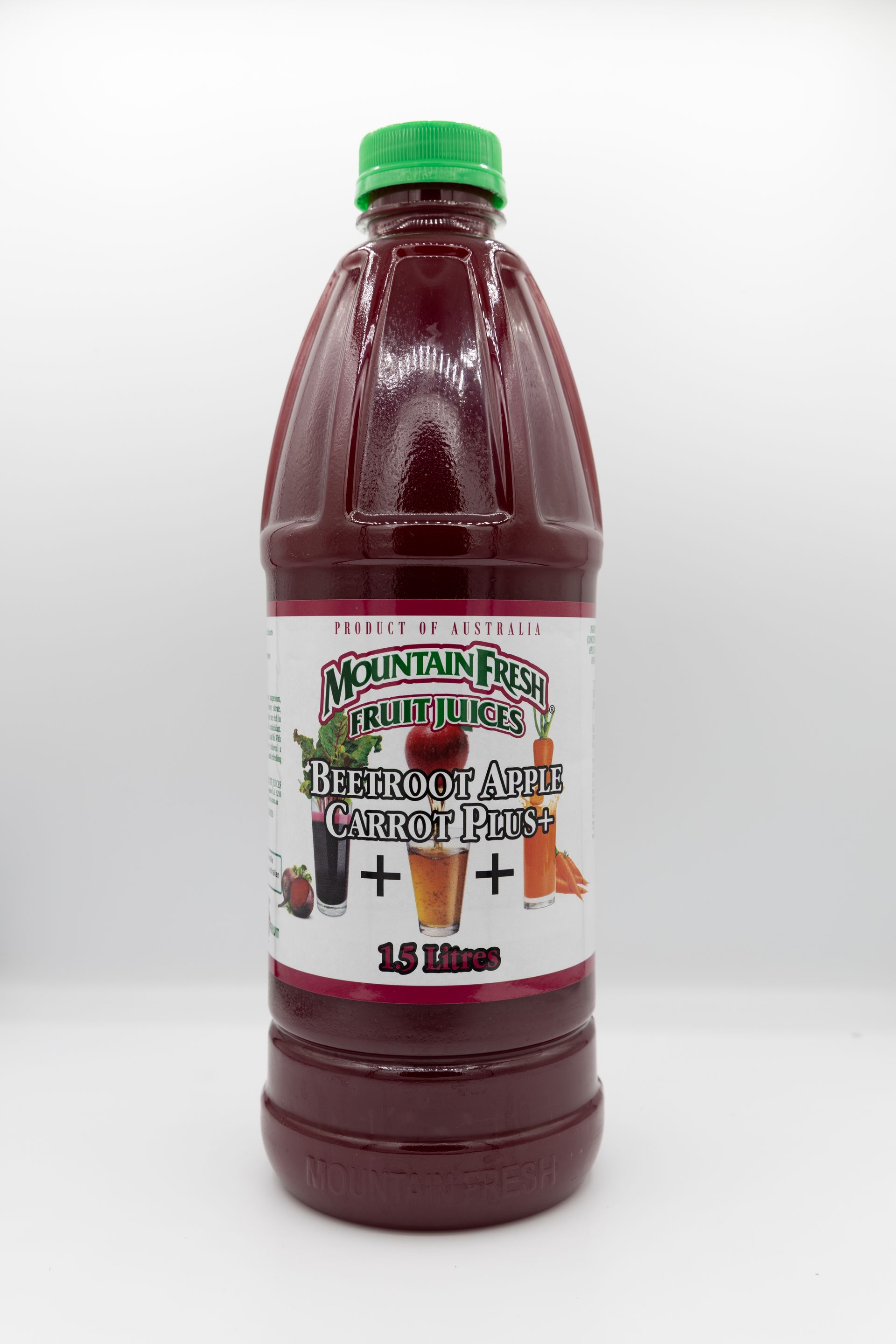 Bottle of dark red juice with a green cap on a white background