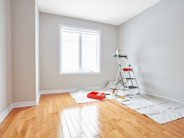 An empty room with freshly painted walls.
