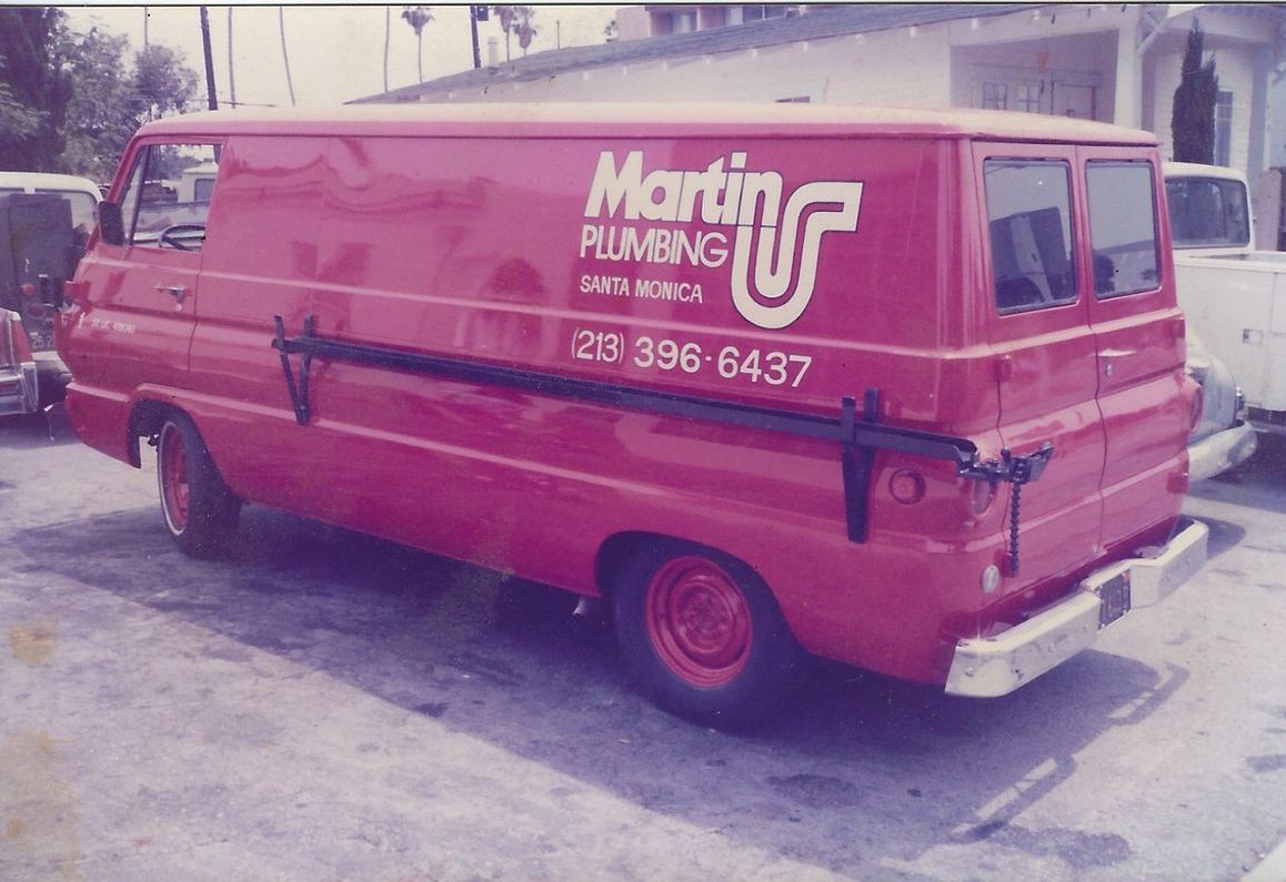 Red Martin Plumbing van in San Gabriel, CA, with a phone number.
