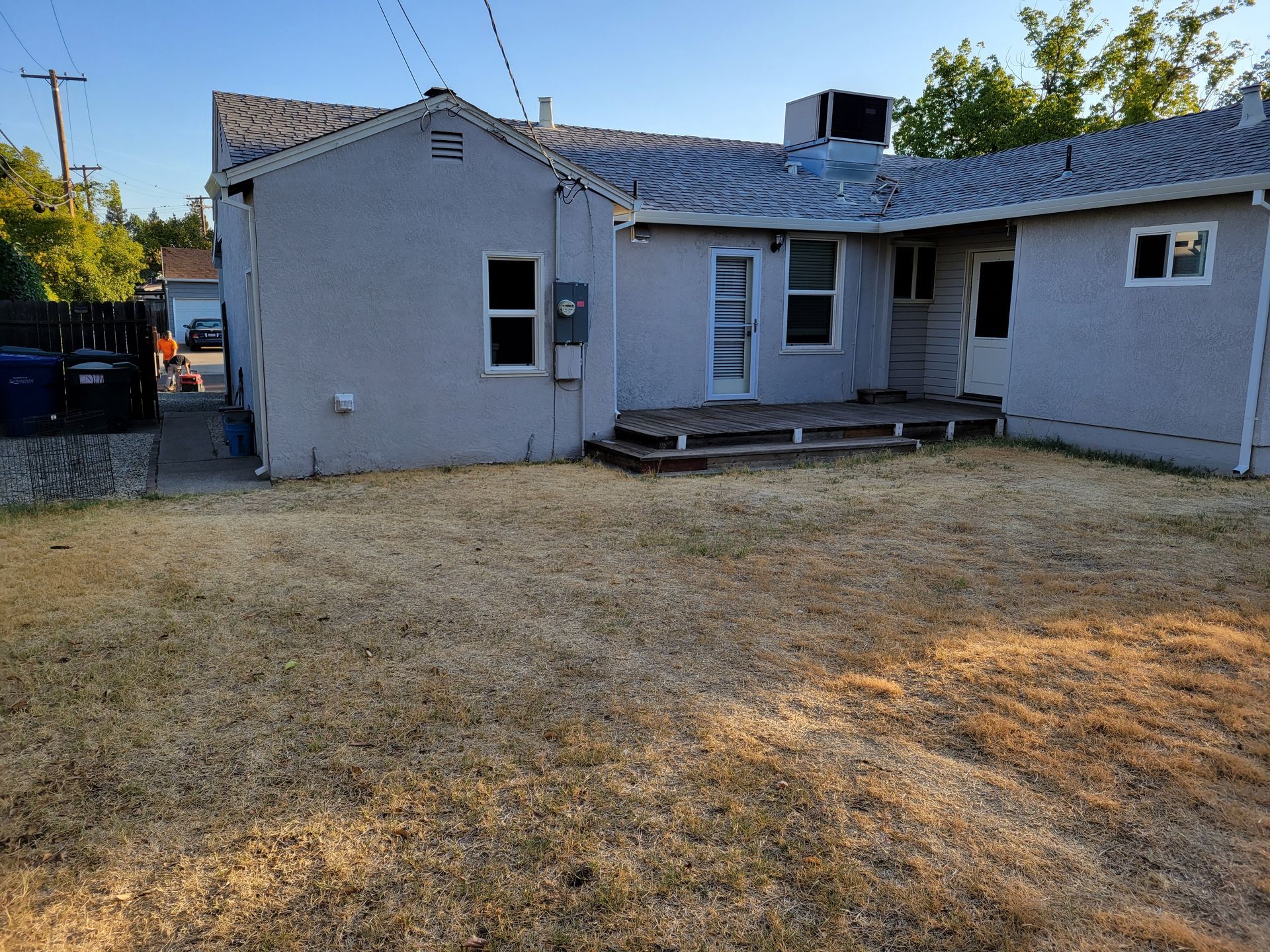 A house with a lot of grass in front of it