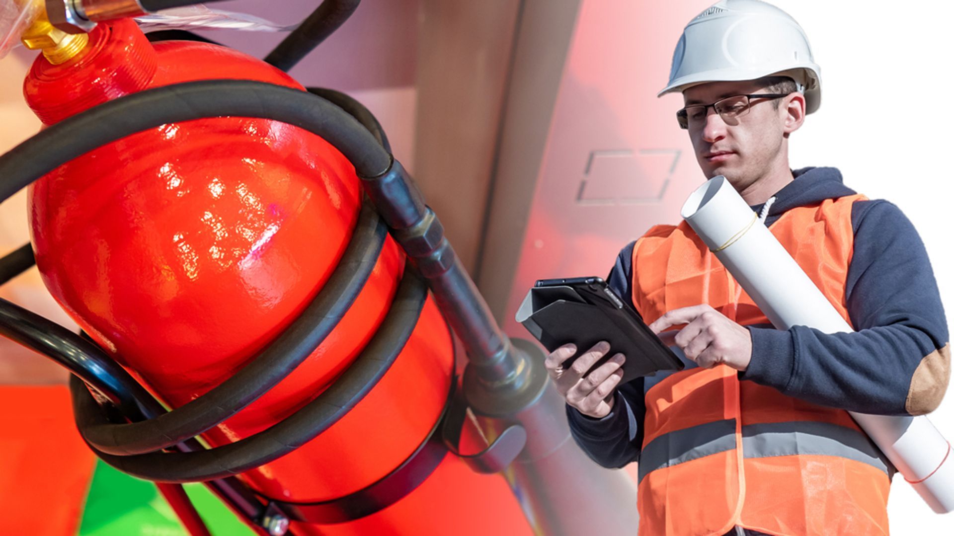 A Man Is Standing Next To A Fire Extinguisher And Using A Tablet — Firewerx In Dubbo, NSW