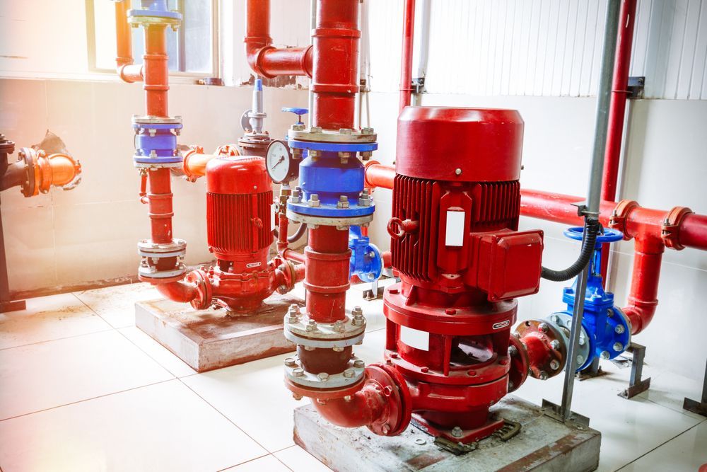 A Room Filled With Lots Of Red Pipes And Pumps — Firewerx In Dubbo, NSW