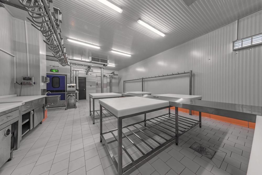 A Kitchen with A Lot of Tables and Counters in It — Firewerx In Dubbo, NSW