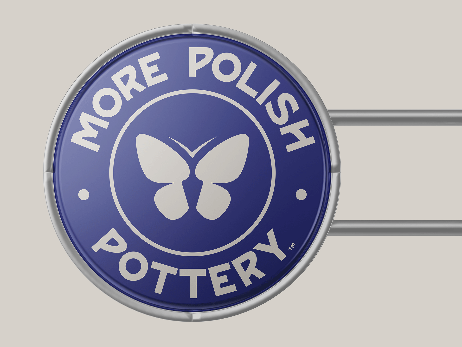 Blue circular “More Polish Pottery” logo with a white butterfly icon.