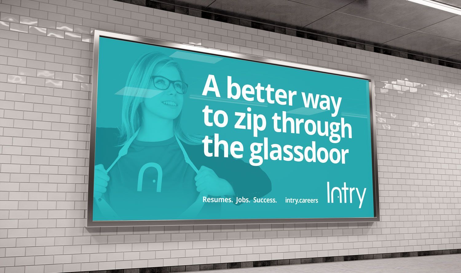 Turquoise ad poster on a brick wall reading “A better way to zip through the glassdoor” with the Intry logo.