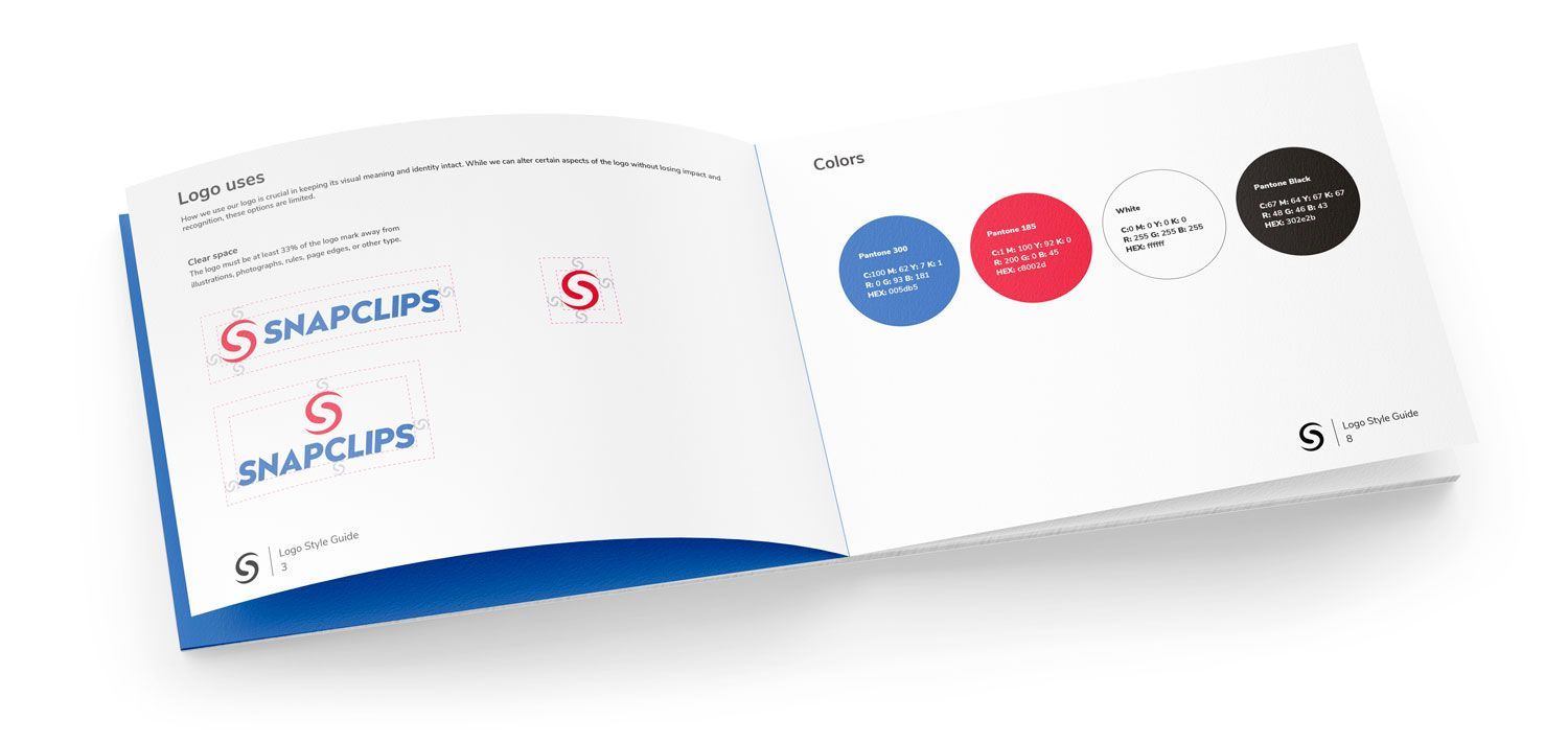 Open brochure spread with blue, red, and black circular graphics and a blue footer band 