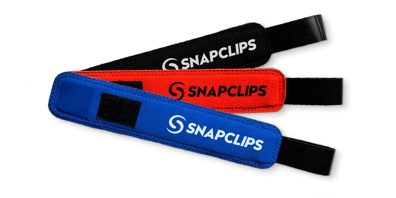 Three Snapclips wrist straps in blue, red, and black with black straps attached – as seen on Shark Tank