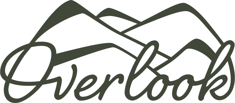 A logo for overlook with a mountain in the background.