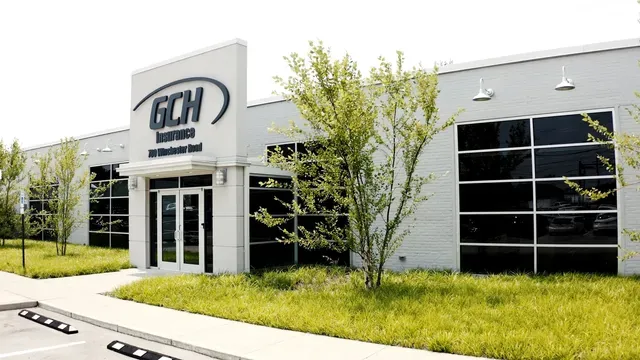 A white building with the word gch on it