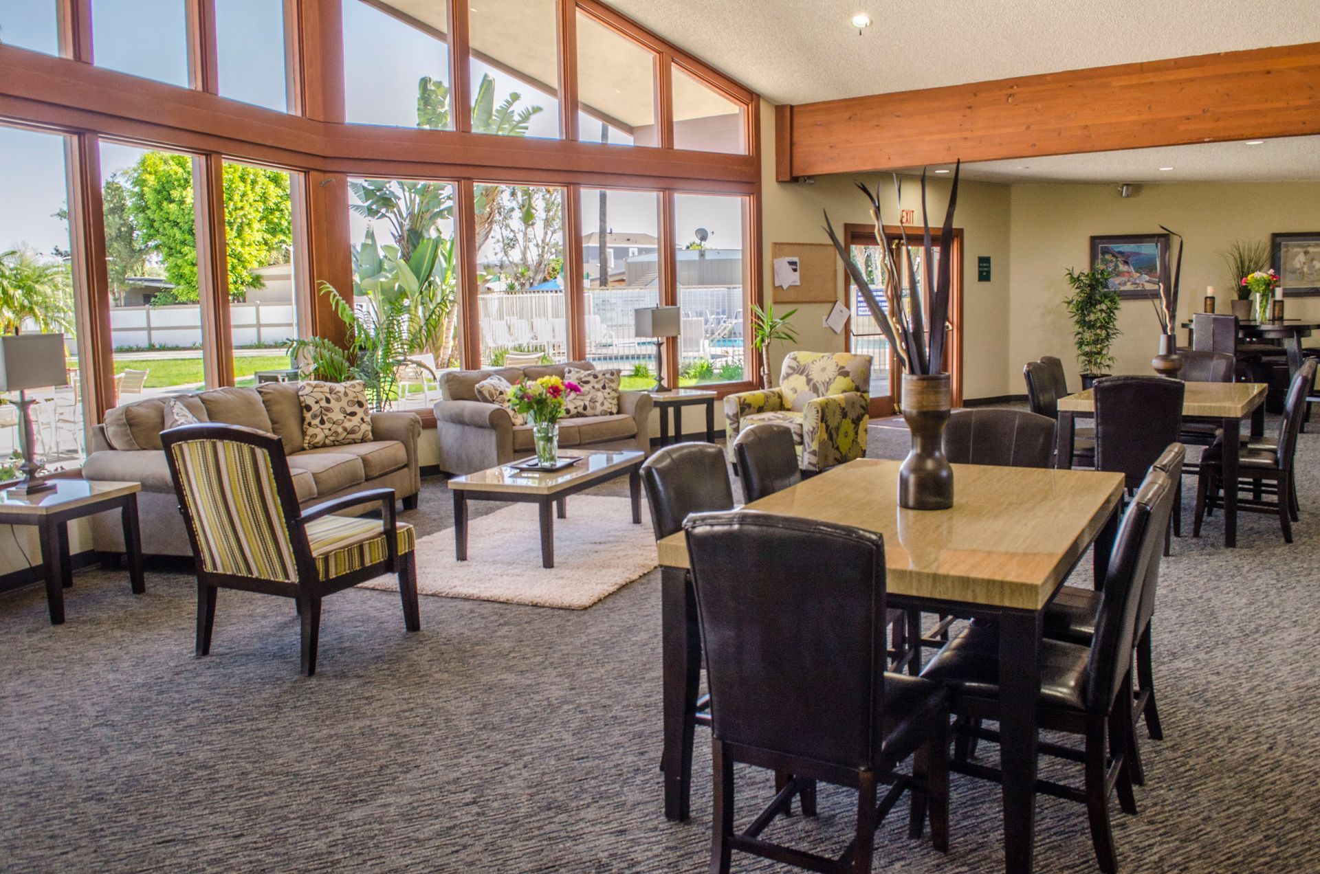 Photo of Clubhouse and Ceiling to Floor Window.