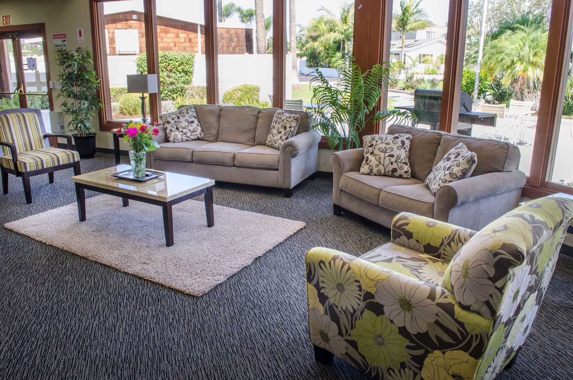 Photo of Clubhouse with Furnishing and Ceiling to Floor Window..